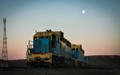 Hitchhiking on Top of a Mile Long Iron Ore Train Across the Sahara